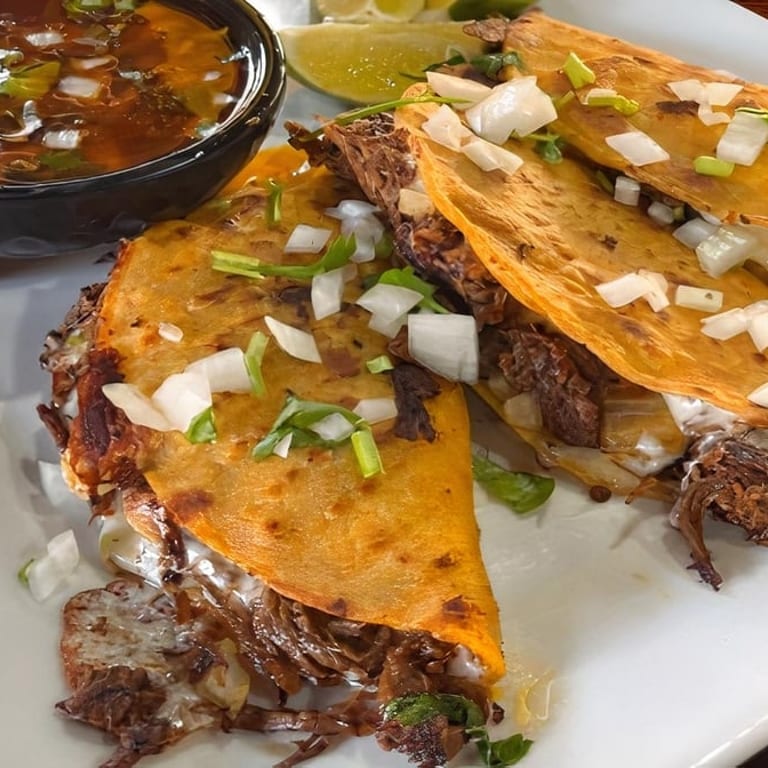 Delicious Birria Tacos Await